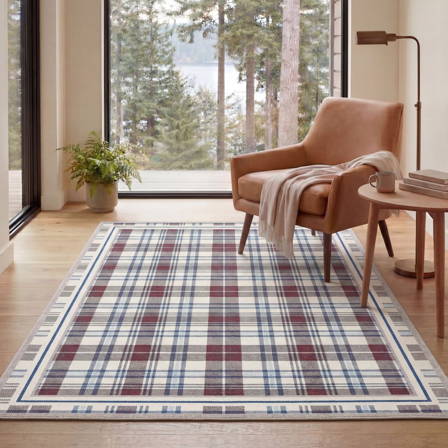 Plaid rug in a room with a chair and a view of trees
