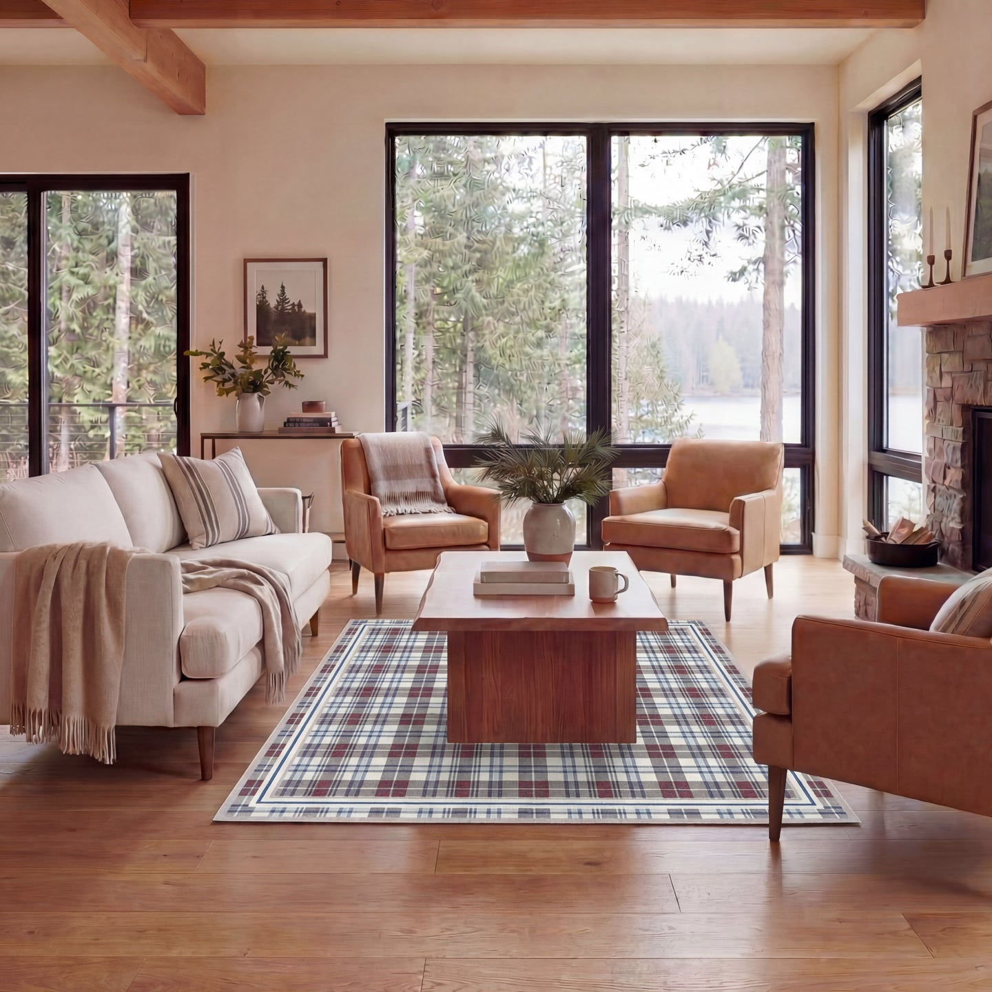 Cozy living room with beige sofa, brown armchairs, and wooden coffee table in a home with large windows.