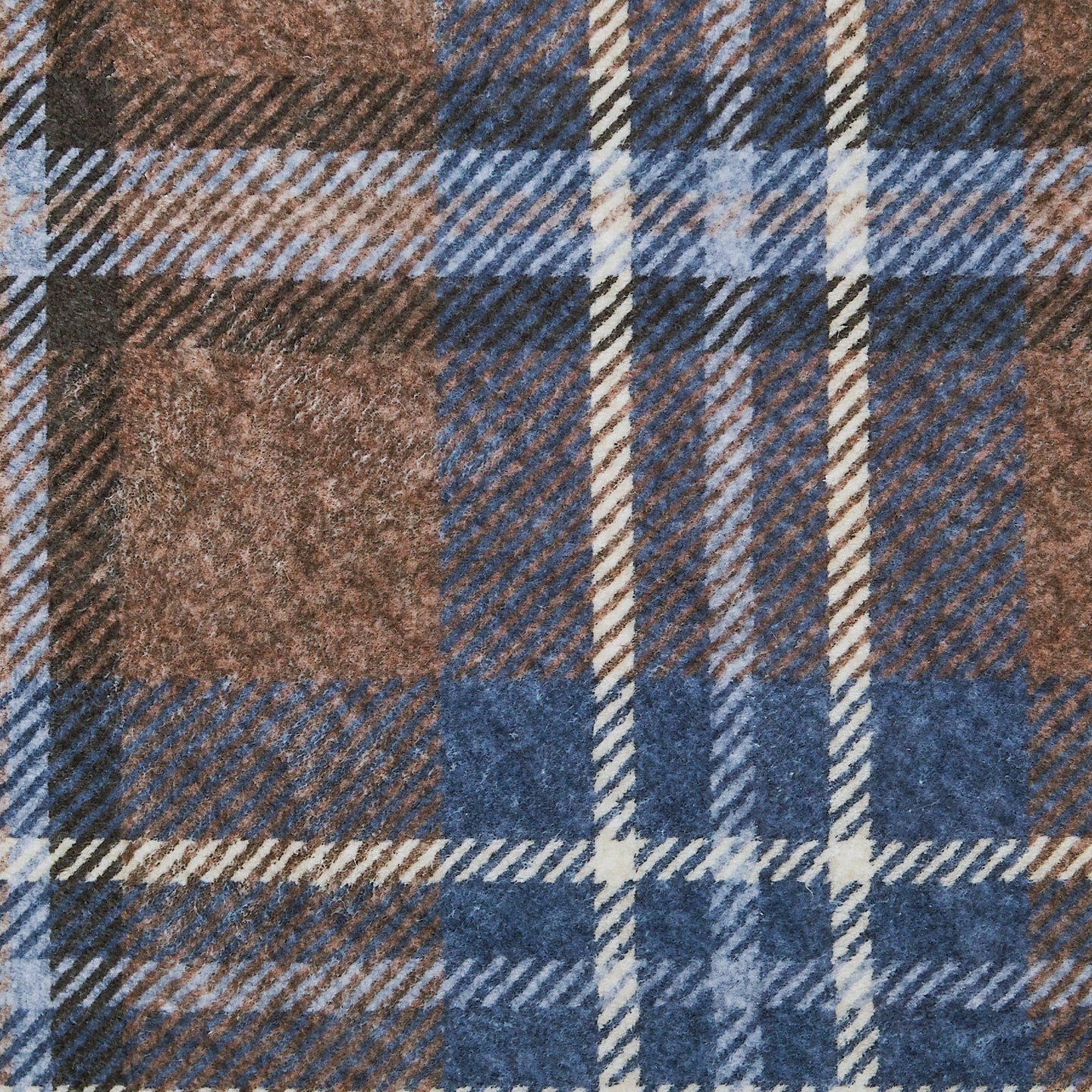 Close-up of a plaid fabric with brown, blue, and beige colors.