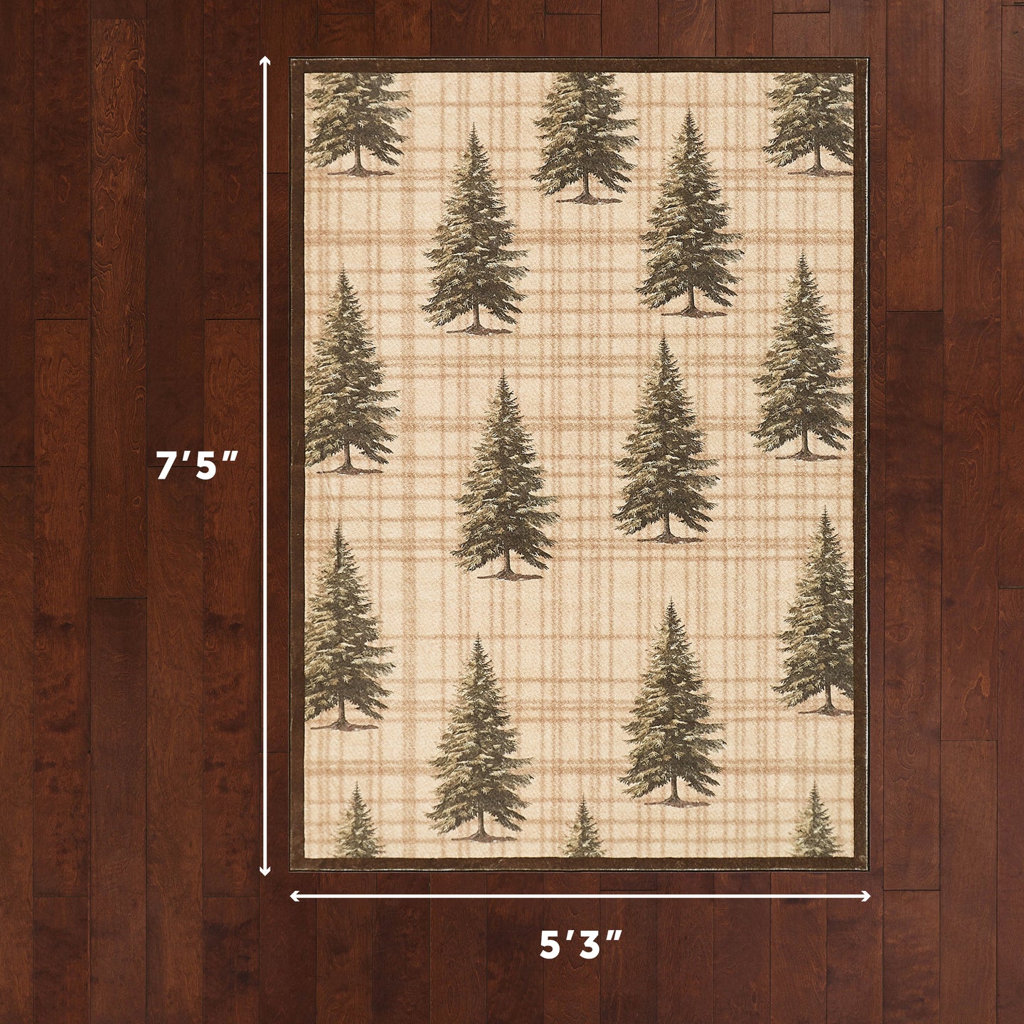 Cream and tan plaid area rug with scattered green pine tree pattern and brown border, 5'3" x 7'5".